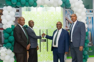 Left to Right Kingdom Bank Industrial Area Branch Manager Martin Muriithi Pastor Hudson Mukunza Kingdom Bank Managing Director and CEO Anthony Mburu and Head of Business Development Alex Kasiki during the official opening of the Banks 28th branch in Industrial Area