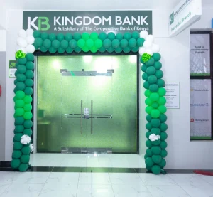 KB Naivasha Branch Opening - Front of the Branch - Kingdom Bank Ltd Entrance to Kingdom Bank branch decorated with green and white balloons for inauguration or promotion.